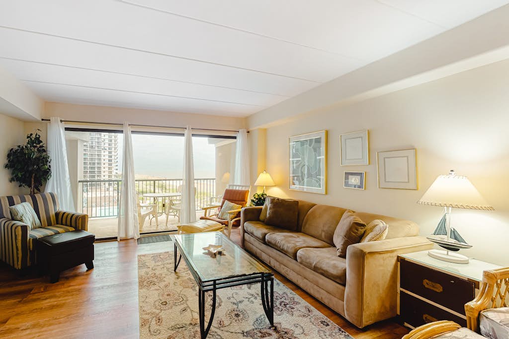 Oceanfront condo with balcony, outdoor pool,  & washer/dryer