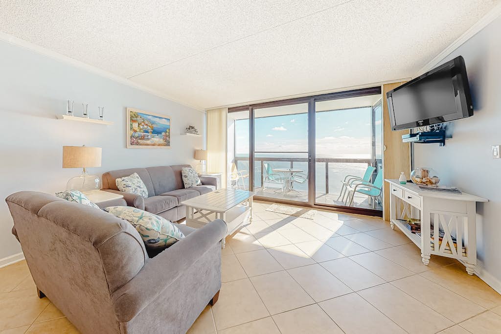 Updated oceanfront condo with ample balcony, AC, pools, gym & sauna
