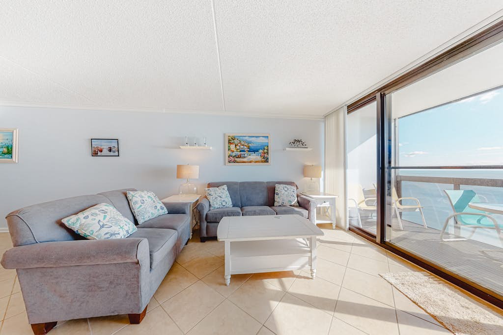 Updated oceanfront condo with ample balcony, AC, pools, gym & sauna