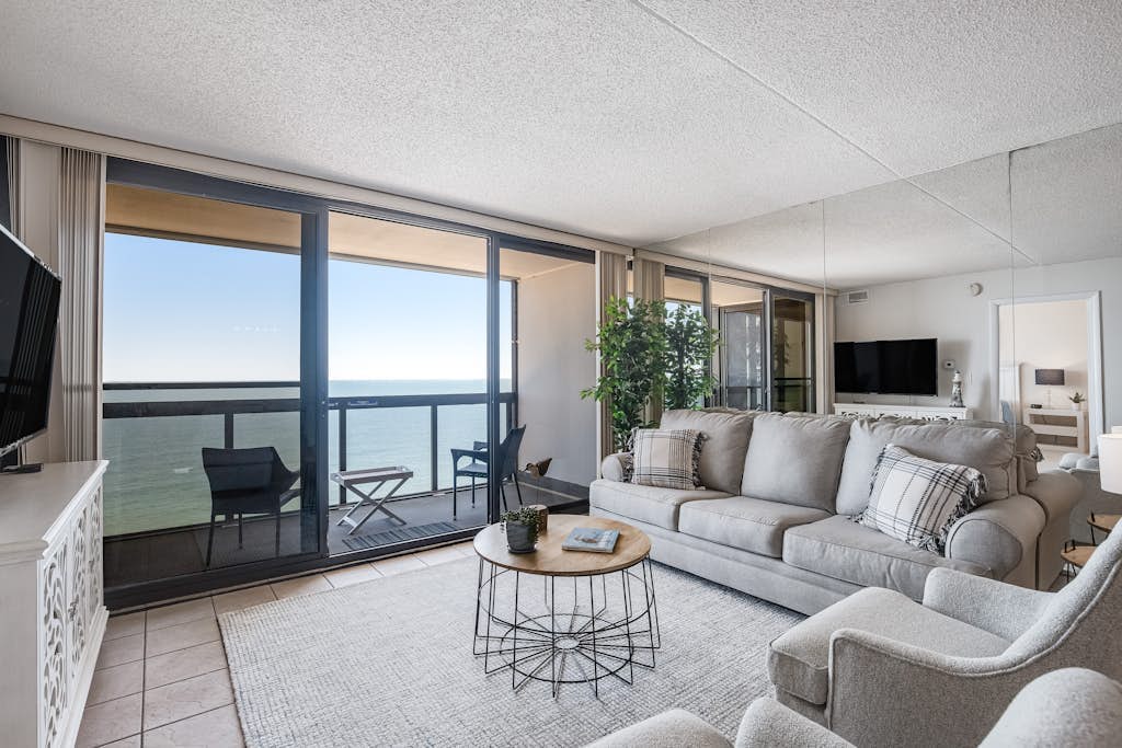 Beachfront condo with great views, balcony, pools & game room