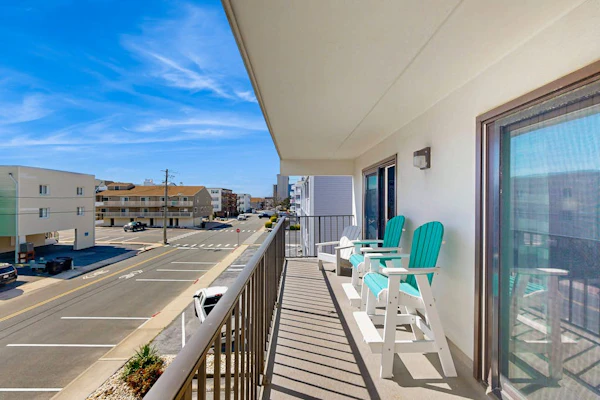 Second-Floor Condo 1 Block from the Beach w/ Balcony, AC, WiFi & Shared Pool