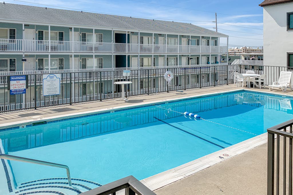 Second-Floor Condo 1 Block from the Beach w/ Balcony, AC, WiFi & Shared Pool
