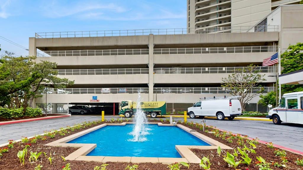 Sunny coastal condo with beach views, balcony, pools, gym, sauna & AC