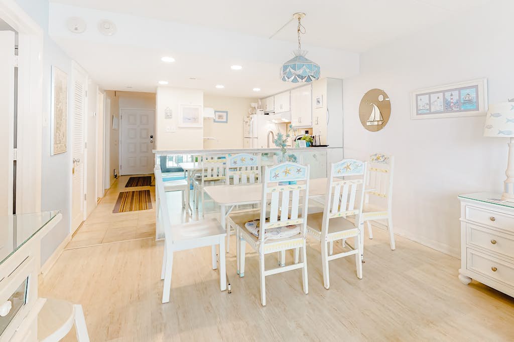 Incredible condo with tennis court views, balcony, pools, game room & gym