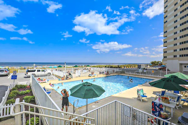 Ideal waterfront condo with pools, private balcony & W/D