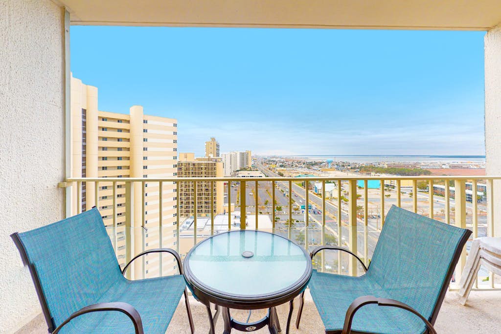 Convenient condo with side ocean views, balcony, pools, & tennis