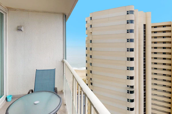 Convenient condo with side ocean views, balcony, pools, & tennis