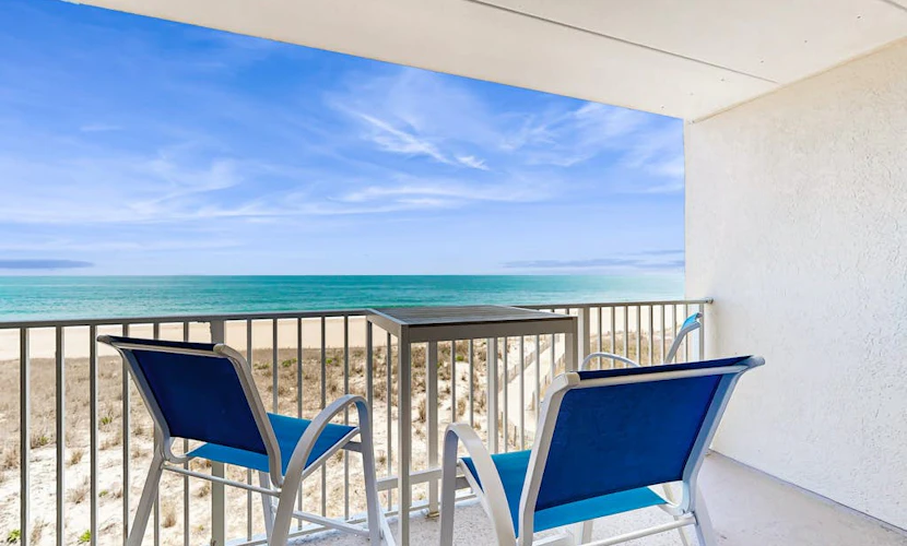 Oceanfront condo near golf with pool, balcony, central AC, & washer/dryer