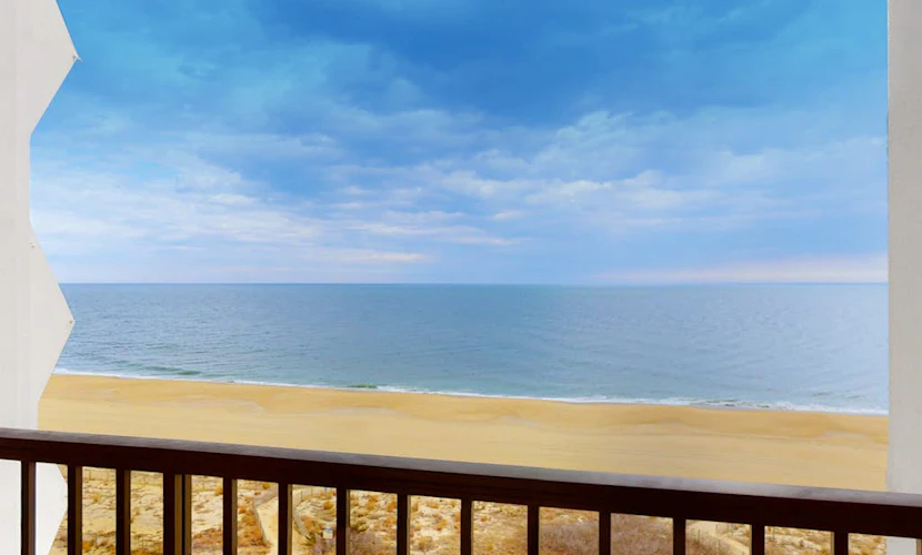Oceanfront Condo with Beach Views, Balcony, AC, WiFi & Shared Outdoor Pool