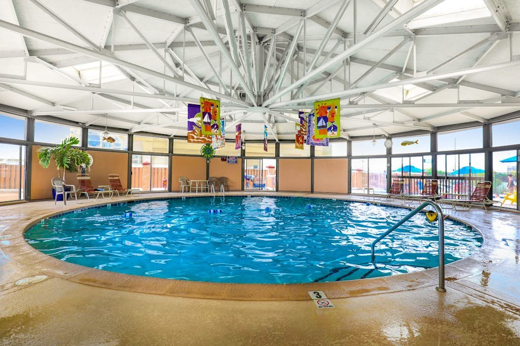 Modern, ocean-view condo with balcony, pools, saunas, tennis & gym