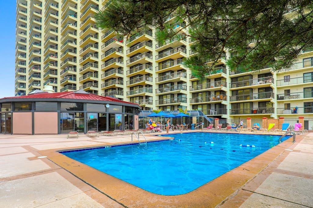 Modern, ocean-view condo with balcony, pools, saunas, tennis & gym