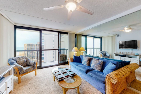 Breezy inviting condo with balcony, pools, gym, game room & tennis