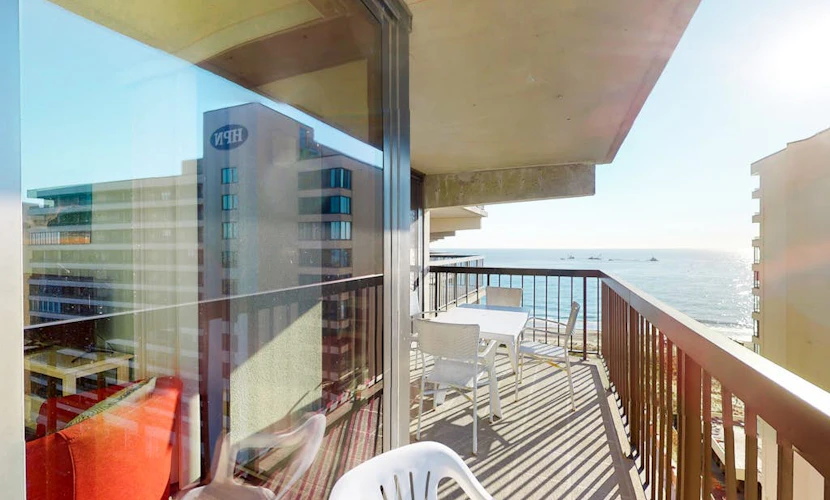 Coastal condo with pools, game room, gym, sauna & central AC
