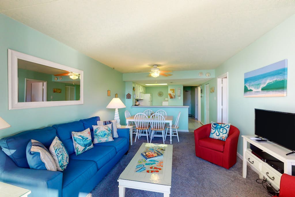 Coastal condo with pools, game room, gym, sauna & central AC