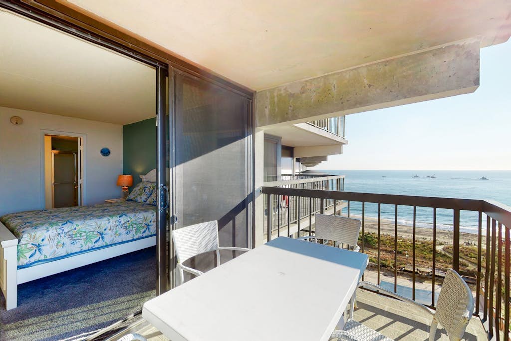 Coastal condo with pools, game room, gym, sauna & central AC