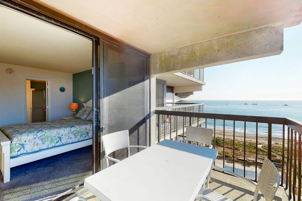 Coastal condo with pools, game room, gym, sauna & central AC