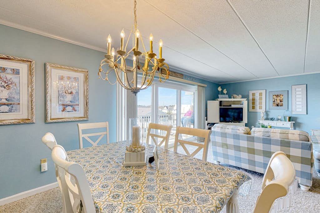 Water view condo with beach and pool access - balcony, W/D, and central AC