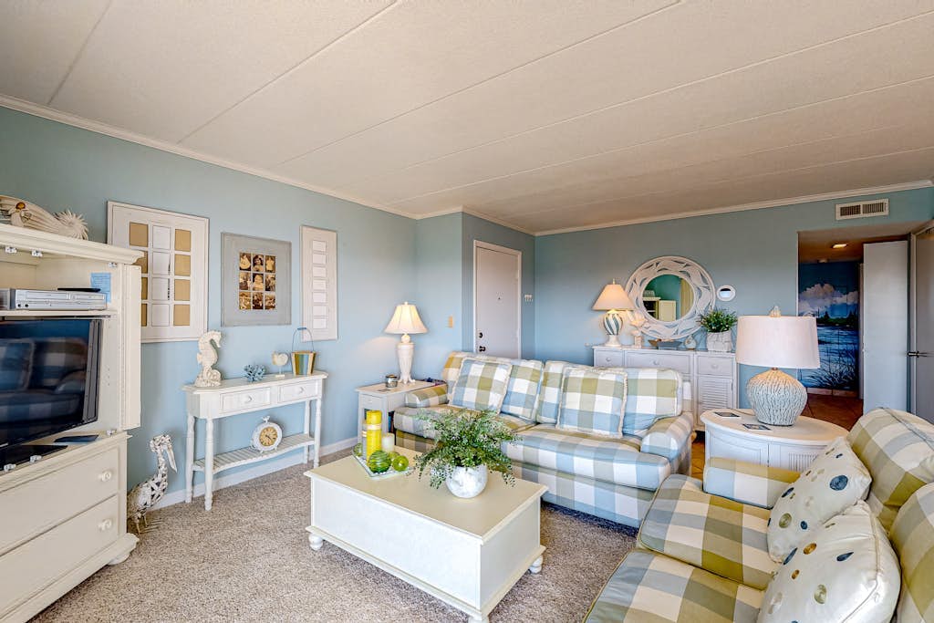 Water view condo with beach and pool access - balcony, W/D, and central AC