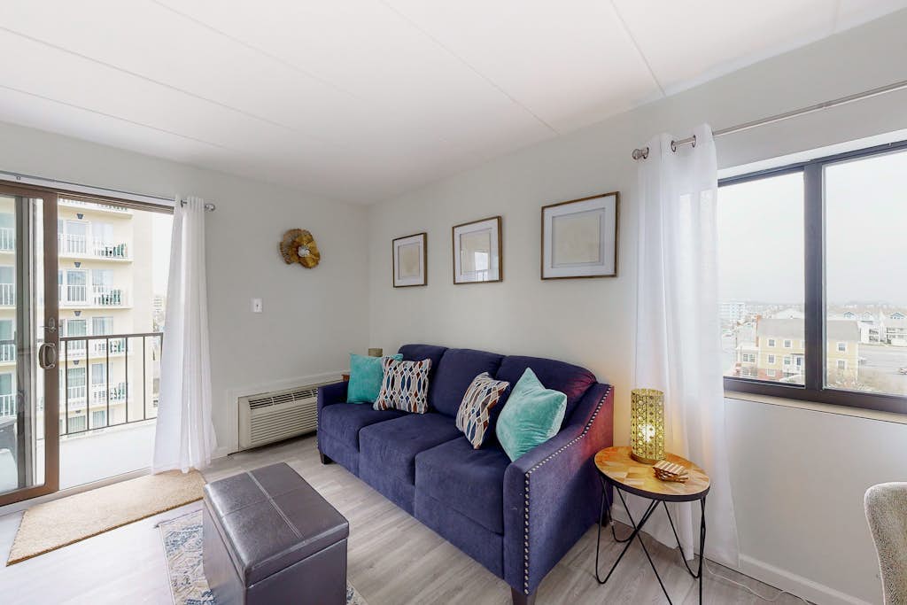 Boardwalk condo with ocean view, pool, direct beach access, balcony & W/D