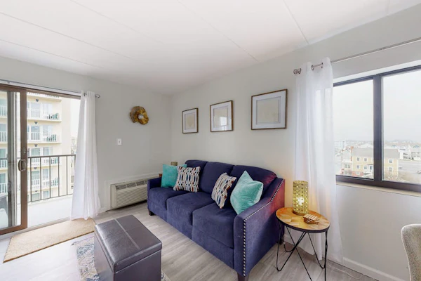 Boardwalk condo with ocean view, pool, direct beach access, balcony & W/D