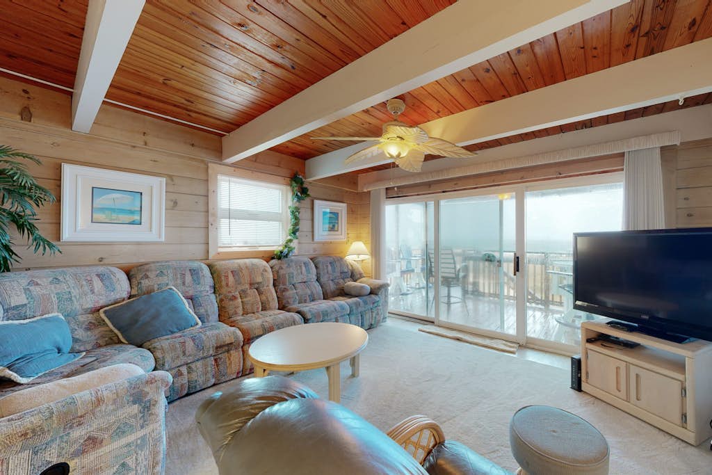 4-Story beachfront townhome with ocean views, balconies, deck, outdoor shower