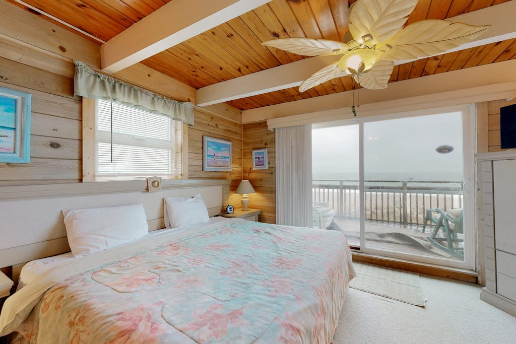 4-Story beachfront townhome with ocean views, balconies, deck, outdoor shower