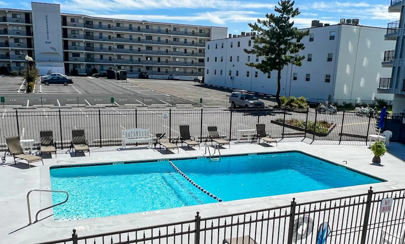 Recently updated condo with pool, private balcony, & washer/dryer