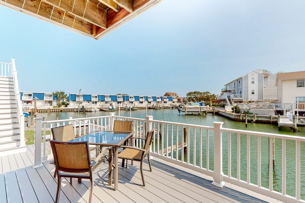 Waterfront townhome with a game room, boat slips, and grill - scenic views