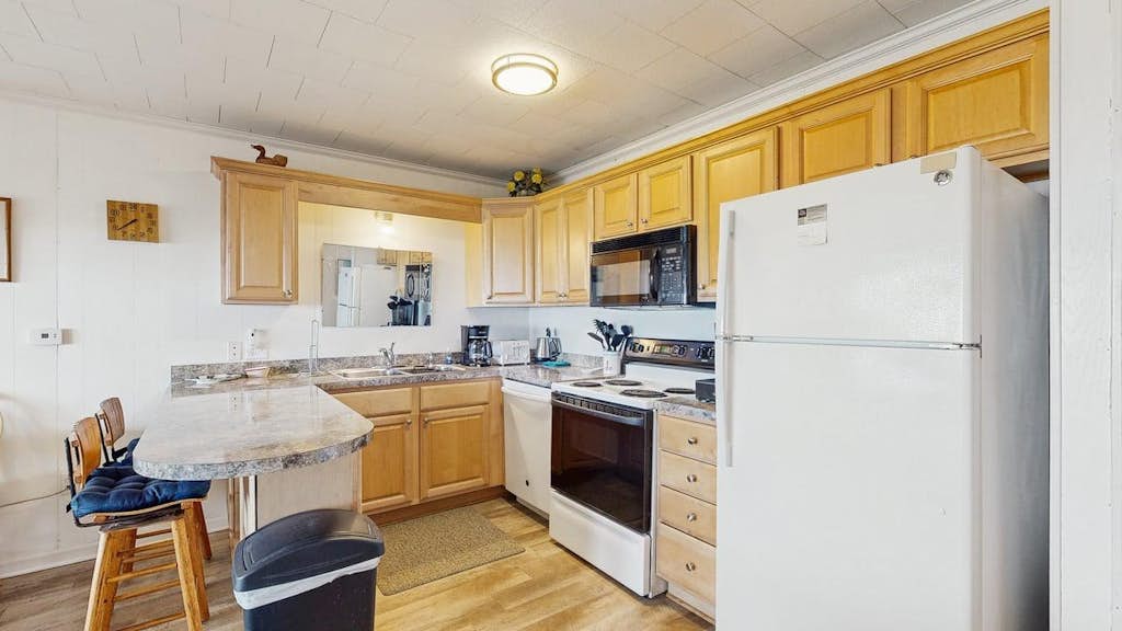 Oceanfront escape close to boardwalk with balcony, W/D, and direct beach access