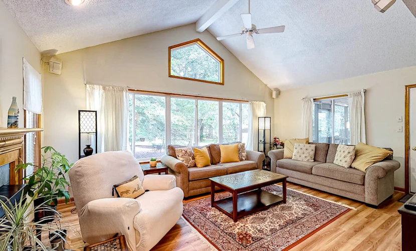 Home with central AC, gas fireplace, washer/dryer, firepit, & shared pools