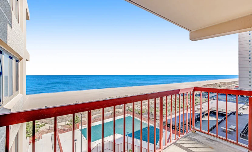 Oceanfront condo with beach access, pool, furnished balcony, & fast WiFi