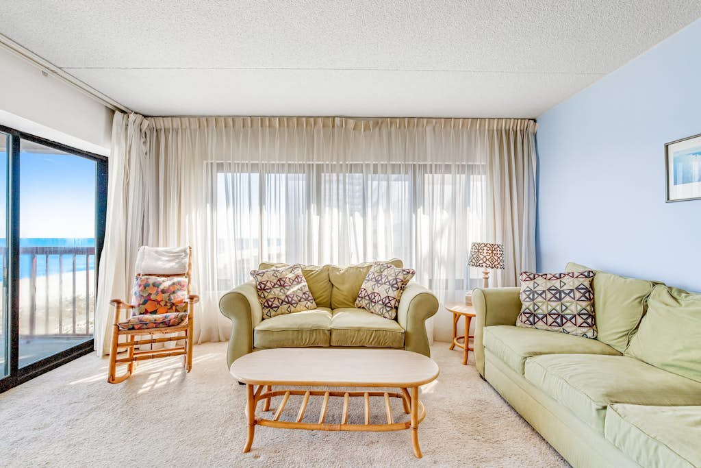Oceanfront condo with beach access, pool, furnished balcony, & fast WiFi