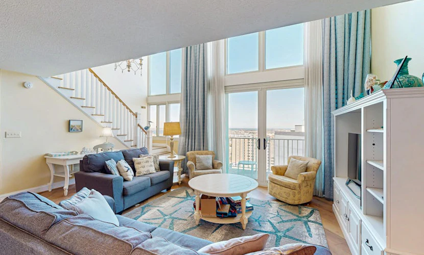 Two-story beachfront penthouse with ocean & bay views, pools & game room