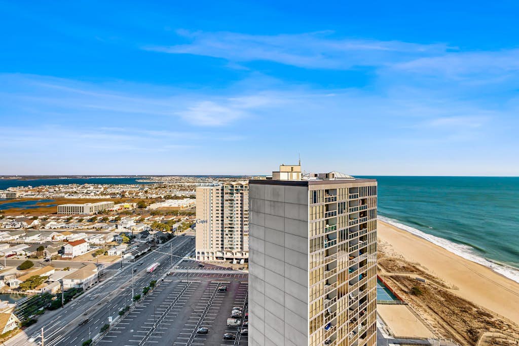 Two-story beachfront penthouse with ocean & bay views, pools & game room