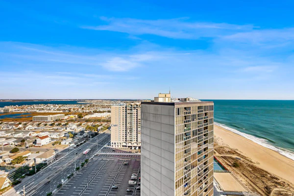 Two-story beachfront penthouse with ocean & bay views, pools & game room