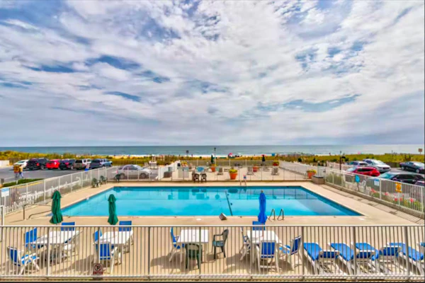 Two-story beachfront penthouse with ocean & bay views, pools & game room