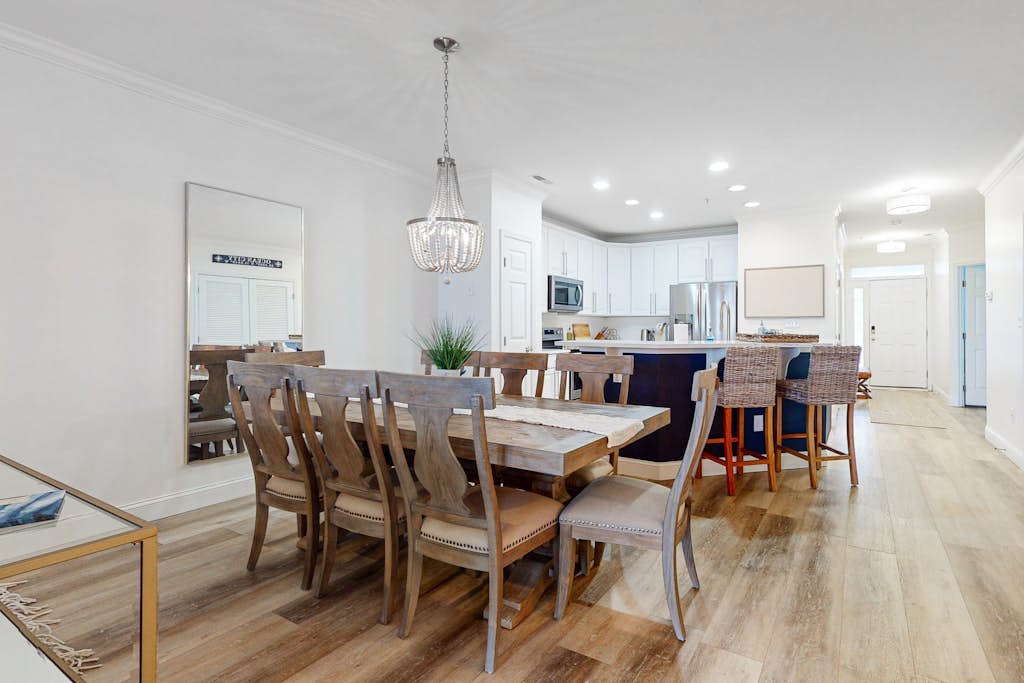 Sunlit island abode with bayside beach, pools, WiFi, balcony, & AC