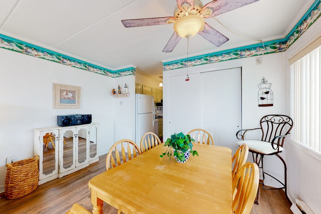 Partial Ocean View Condo w/ Balcony, AC, W/D & Shared Pool - Steps to the Beach