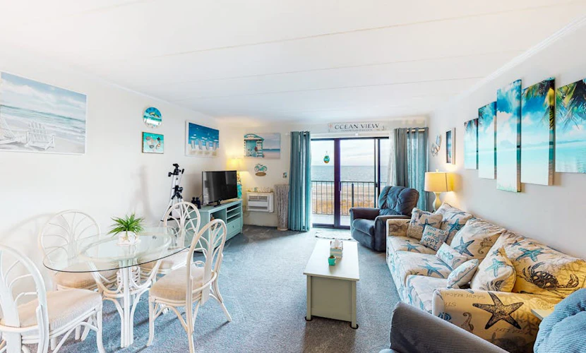 Oceanfront Condo with Direct Beach View, Balcony, AC, WiFi & Laundry