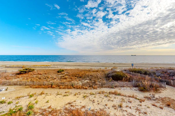 Oceanfront Condo with Direct Beach View, Balcony, AC, WiFi & Laundry