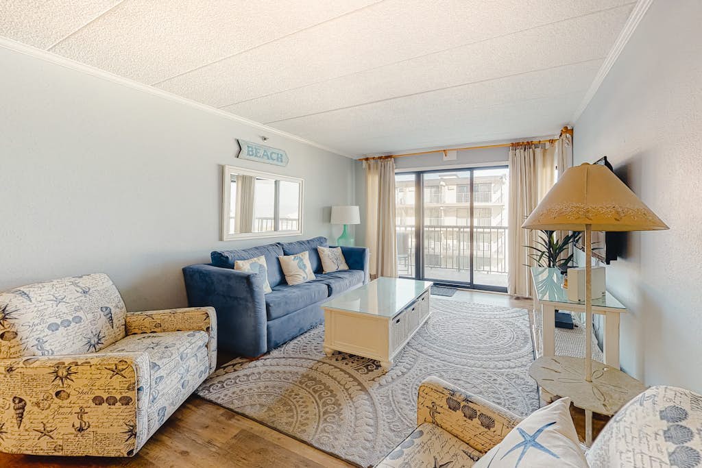 Side Ocean View Condo near the Boardwalk with Balcony, AC, WiFi & Shared Pool
