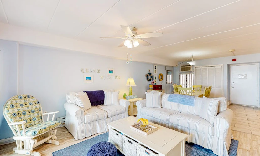 Beachfront condo with ocean views, pool, private balcony, & beach access