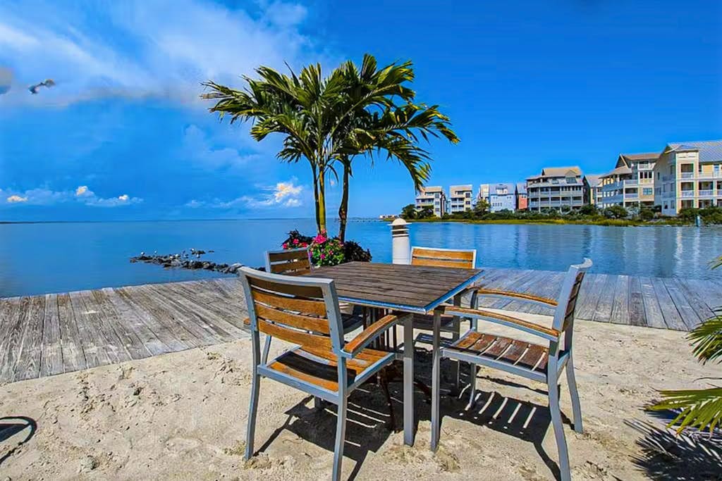 Coastal retreat with beach and shared pool - balconies, AC, & W/D