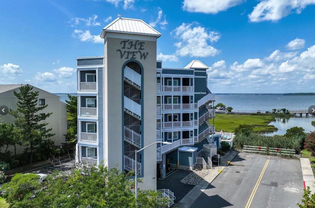 Stunning waterfront condo with bay views, outdoor pool, and private balcony