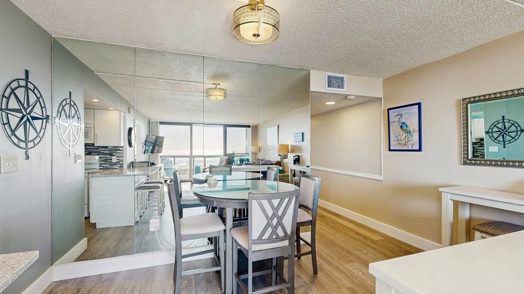Family-friendly oceanfront condo with balcony, pools, game room & gym