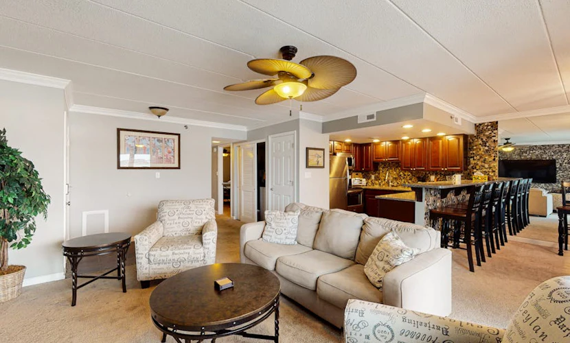 Sunny - bay view condo with balcony, shared pool, W/D, AC, blocks from the beach