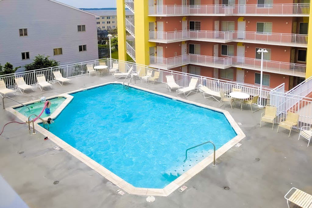 Bright Bayfront Getaway with Peaceful Water Views, Balcony & Shared Pool