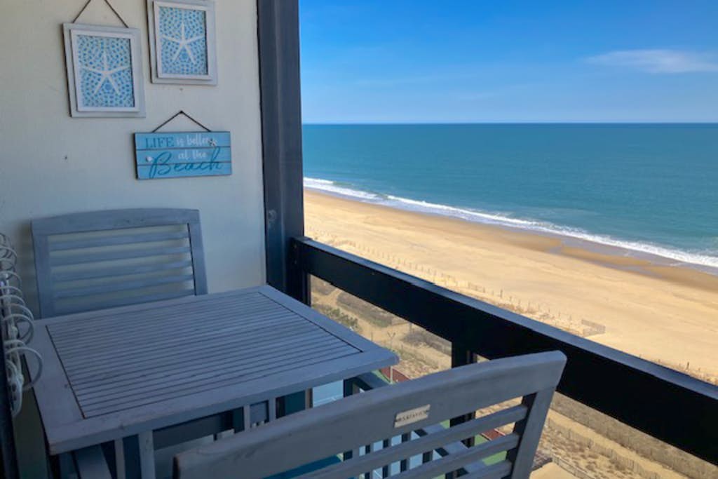 Spacious oceanfront condo with shared pools, game room, gym, and beach views