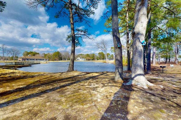 Waterfront townhome on the golf course with private deck, & paid-access pools