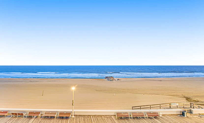 Second-floor, ocean-view condo with beach views, pool access, washer/dryer & AC